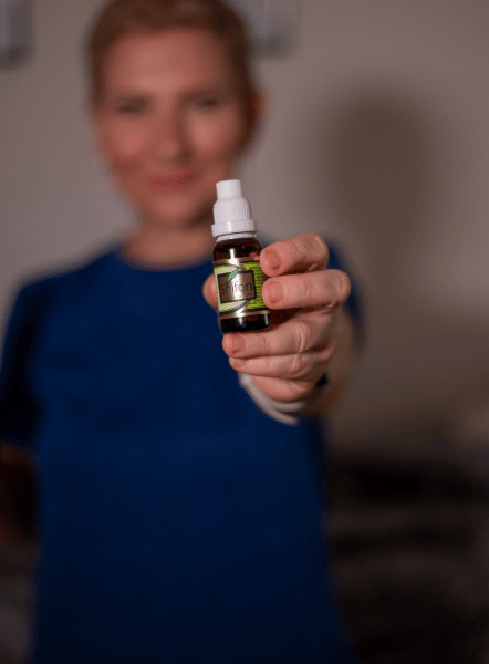 Showing a bottle of oil